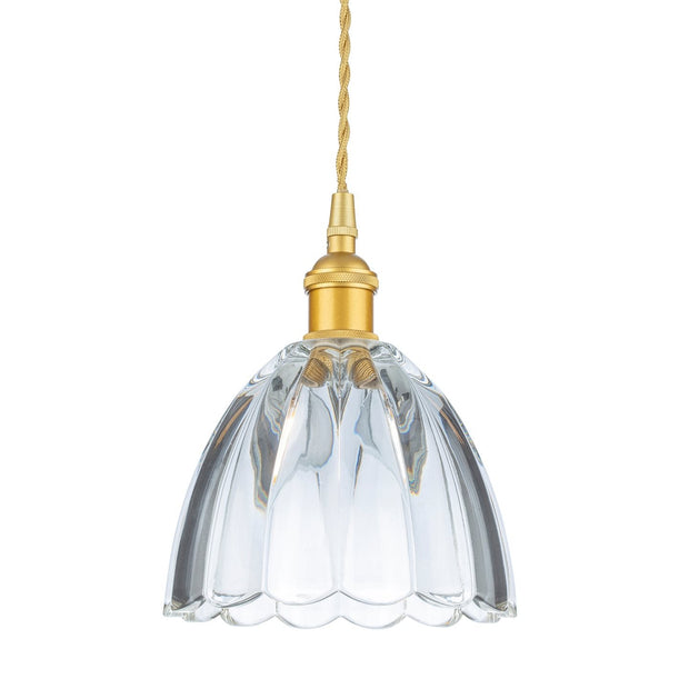 Clear glass pendant light with gold fixture on a white background