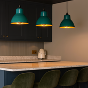 Add a bold pop of colour to your kitchen or dining space with these Teal Enamel Industrial Pendant Lights, designed to combine vibrant style with practical illumination. Featuring a high-gloss teal enamel finish and a warm copper-toned interior, these ceiling lights deliver both striking aesthetics and functional downlighting — ideal for breakfast bars, kitchen islands, or dining areas.

The durable metal shade offers a classic industrial silhouette, while the reflective copper interior enhances the warm gl